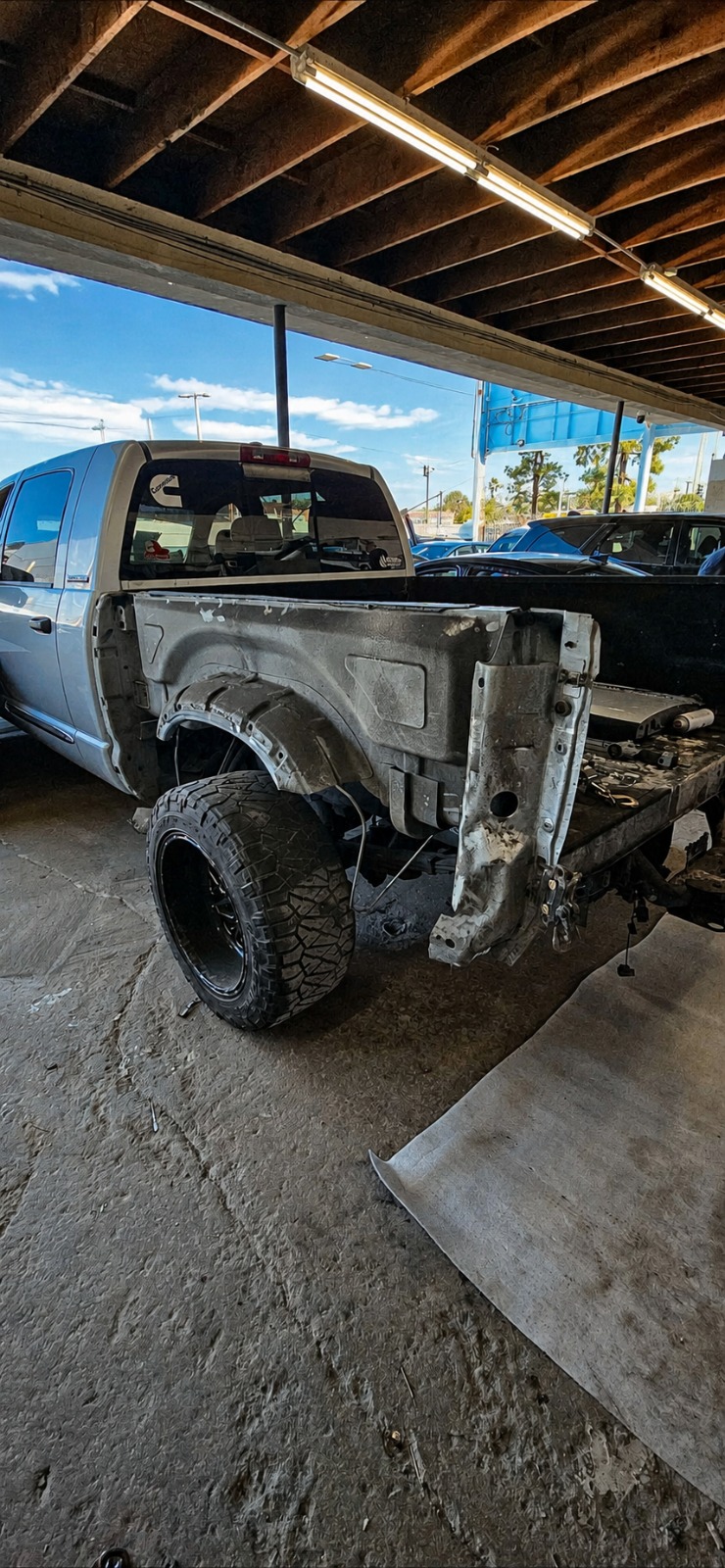 Ram truck bed damage in shop